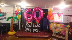 Read more about the article 60th Birthday Party at The Coombe Social Club. Tropical Hawaiian Theme. Bouquets, Numbers and Fresh Fruit Weights